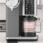 Ninja Swirl by CREAMi ice cream maker on modern kitchen counter dispensing soft serve