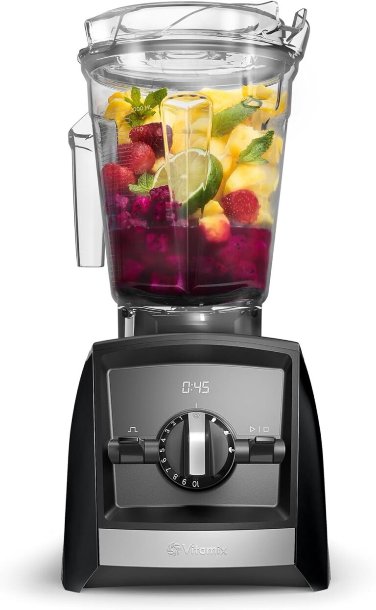 Vitamix A2500 blender filled with pineapple berries and fresh ingredients ready for blending