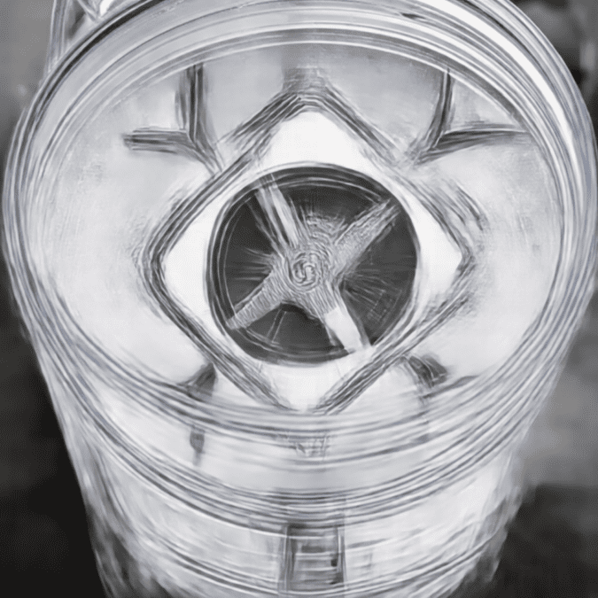 Vitamix blender cleaning itself with water and soap inside container