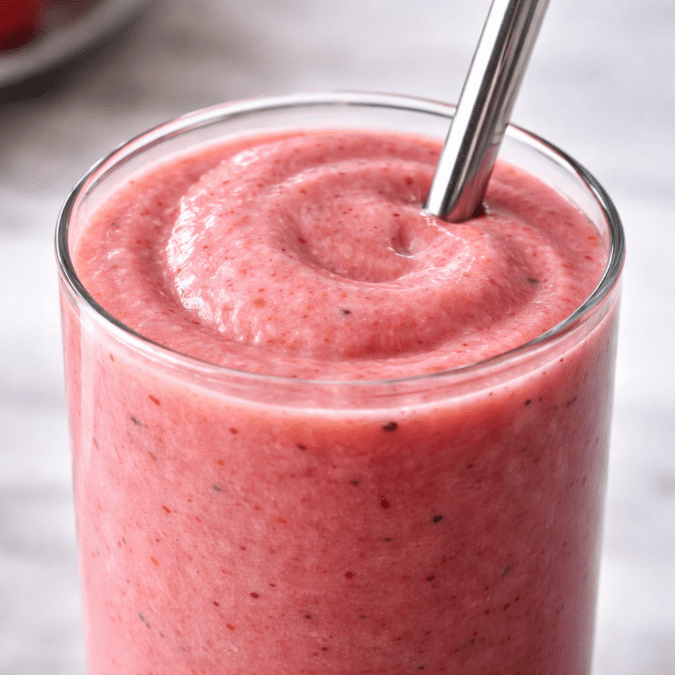 Thick smooth smoothie texture in glass made with Vitamix A3300 blender