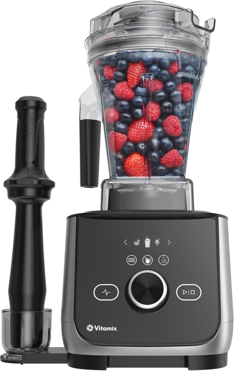 Vitamix Ascent X4 blender in brushed stainless finish blending a smoothie on a kitchen counter