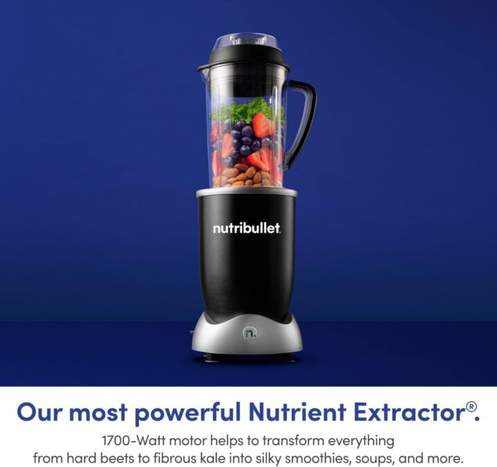 NutriBullet RX blender with fruits, vegetables, and nuts inside, ready for high-powered blending.