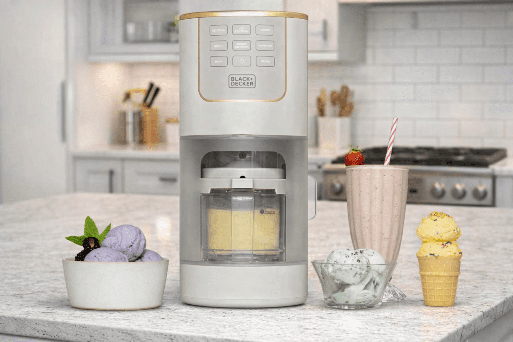 BLACK+DECKER Perfect Pint ice cream maker on a modern kitchen countertop with bowls of ice cream and a milkshake