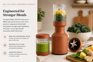 Beast Mighty 850 Plus compact blender with smoothie ingredients on a modern apartment kitchen countertop.